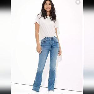 American Eagle High-Rise stretch Artist flare medium wash two button closure 12